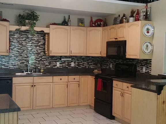 Kitchen & upstairs game room