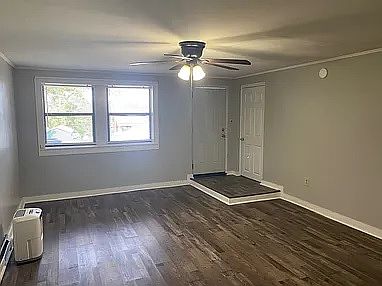 Entry to unit A. Fan in the living area.
