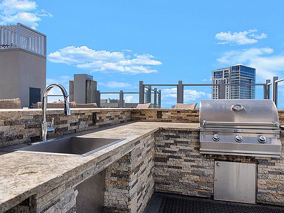SkyDeck with outdoor kitchen and BBQ grills