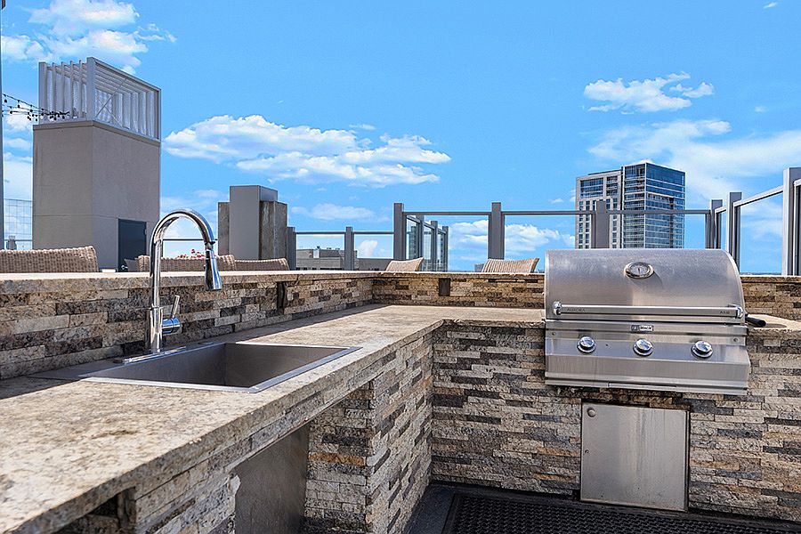SkyDeck with outdoor kitchen and BBQ grills