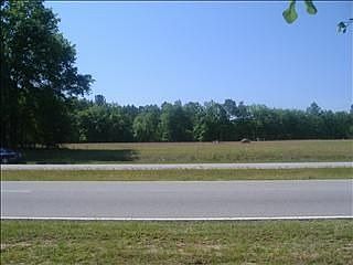 5 Acres & 8400 sq ft buildin