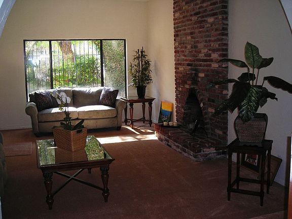 Living Room w/wall-to-ceiling fireplace