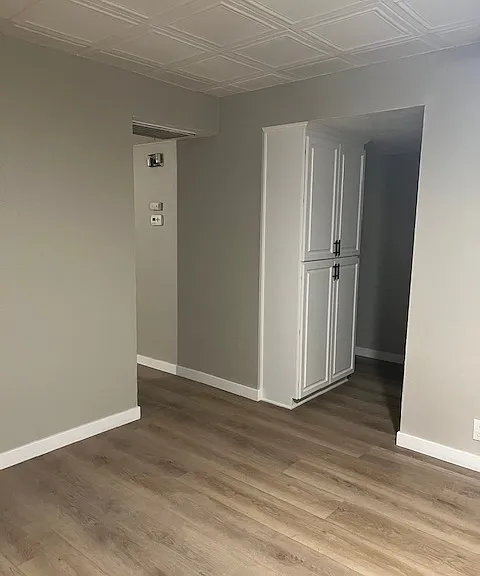 Living room going to kitchen and hallway