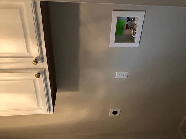 Laundry space. Stackable washer / dryer has been added.