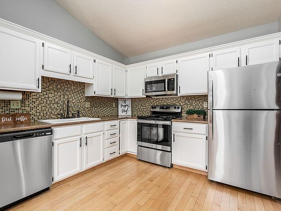 New stainless steel appliances including microwave and dishwasher