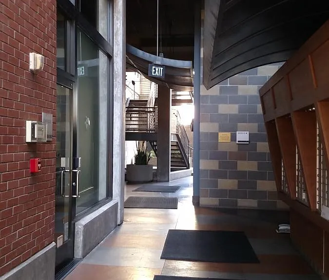 Entrance to building - Mailboxes on right and Gym on left