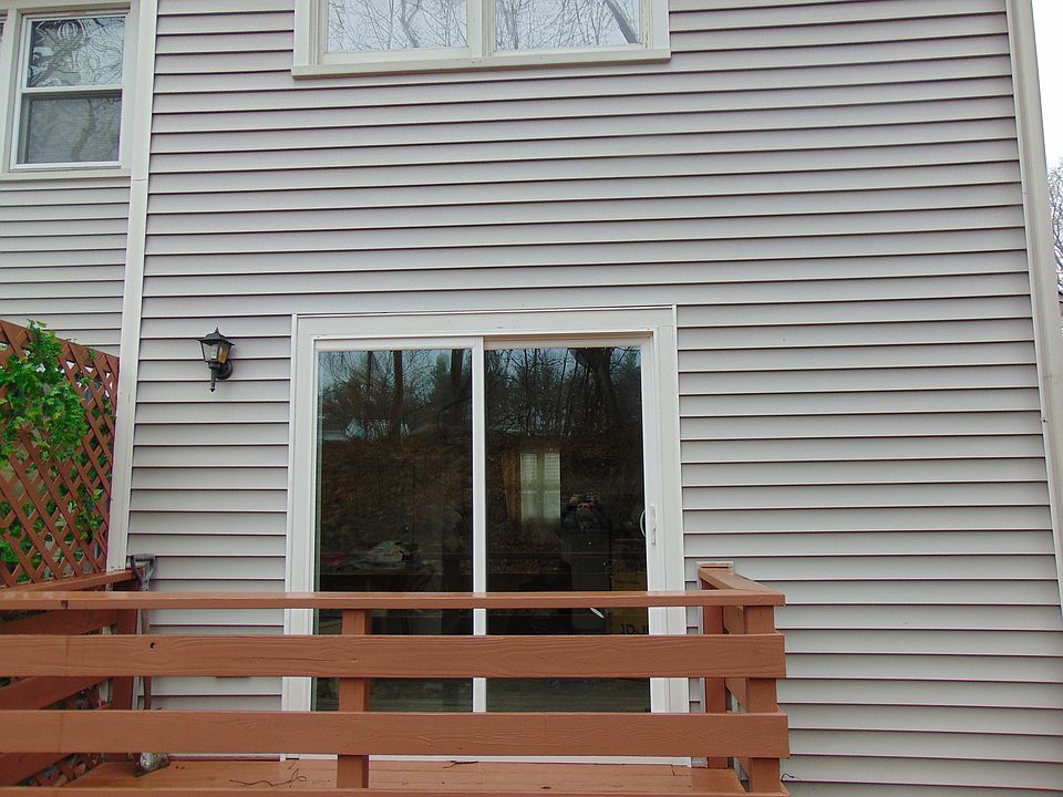 Back patio with sliding door.