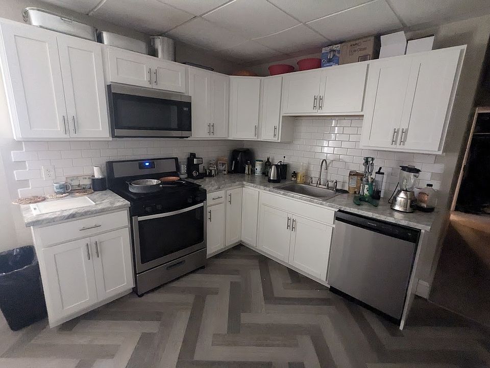 Kitchen - gas stove, microwave, and dishwasher