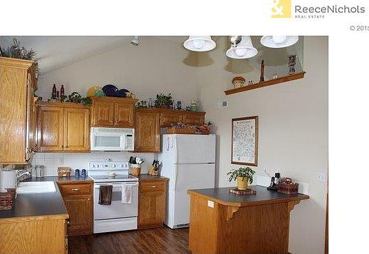 Kitchen With Bar Area