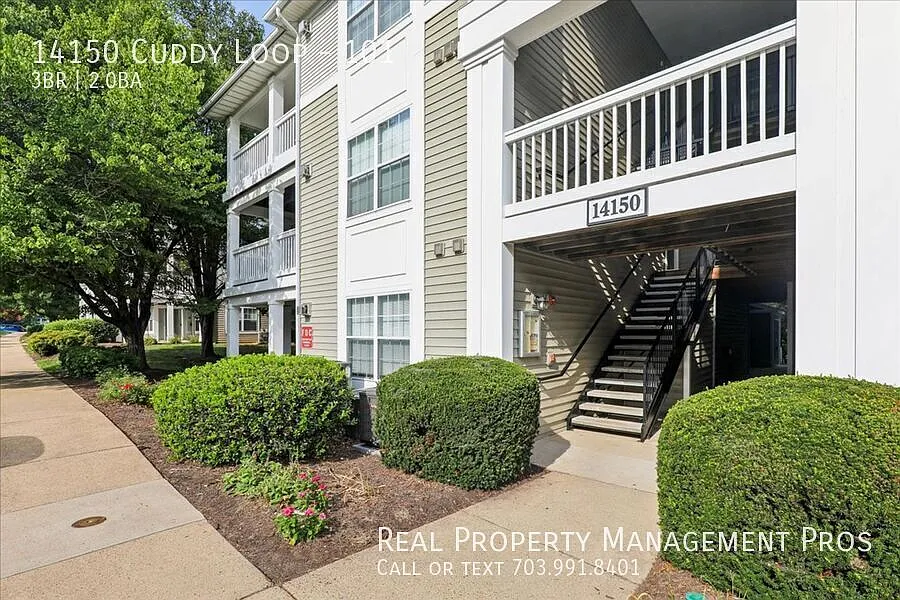 Sun-Filled Corner Condo with Wraparound Patio with Scenic Views! — Photo 1