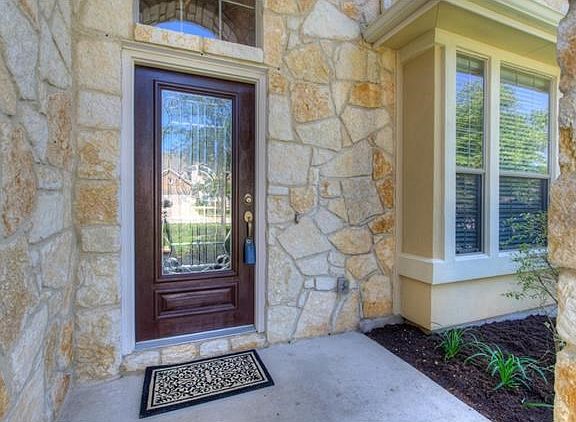 Standing on the front porch, we anxiously await what is behind the beautiful dark wooden and leaded glass front door.   This is what your guests will feel each time they come to visit.