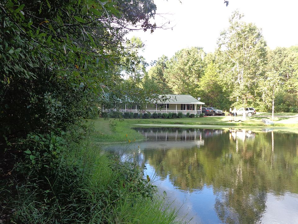 Nice home with pond & land