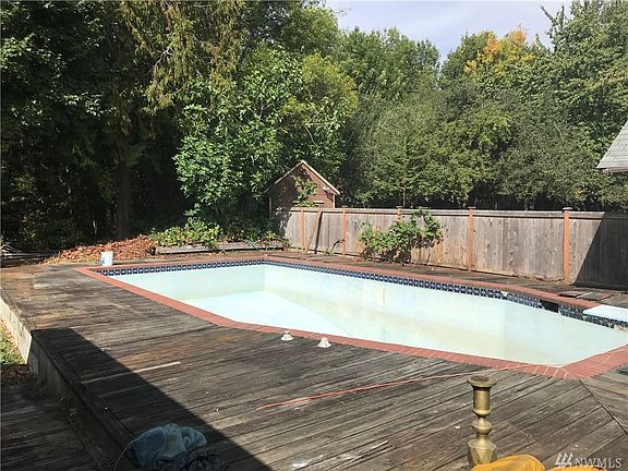 The pool is solid but needs paint and some tile repair. Deck needs to be replaced.