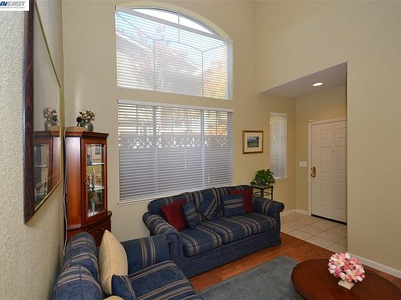 Bright and airy living room with cathedral ceiling