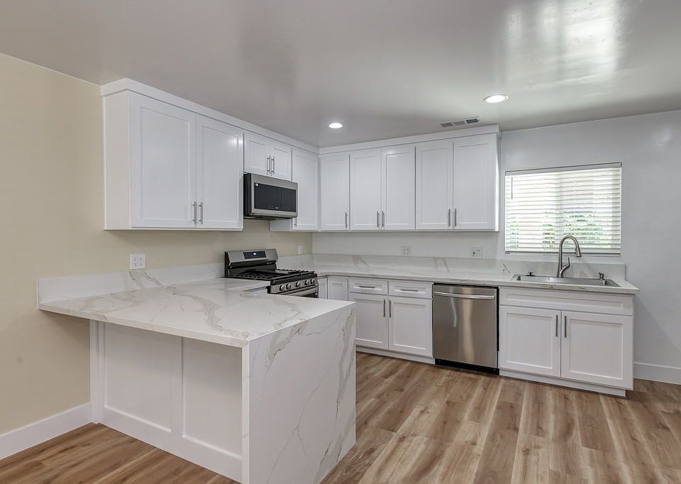 Luxury Kitchen & Appliances, LVP Flooring, Dual Pane Windows, Ceiling Fans, TV Mounts.