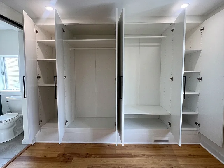 Bedroom 2 - wall-to-wall closet space