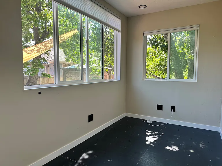 With big windows nestled among the trees, we lovingly call this office space the treehouse.