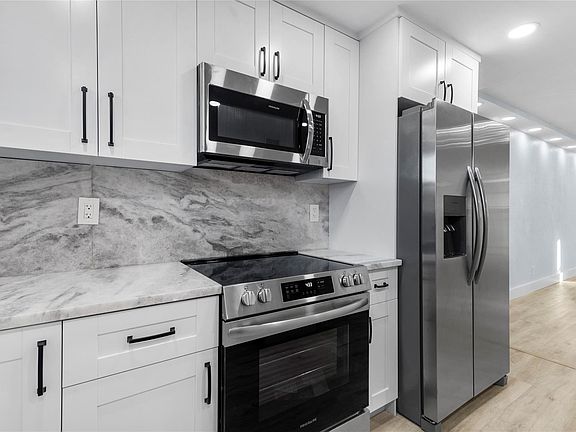 4th image of 9561 Sunrise Lakes Boulevard #107