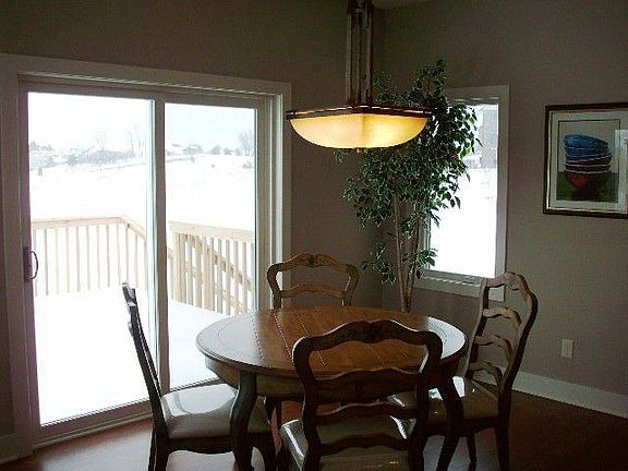 Dinette flanked with windows