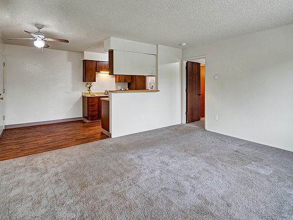 Rancho Tudor Apartments - Living Room