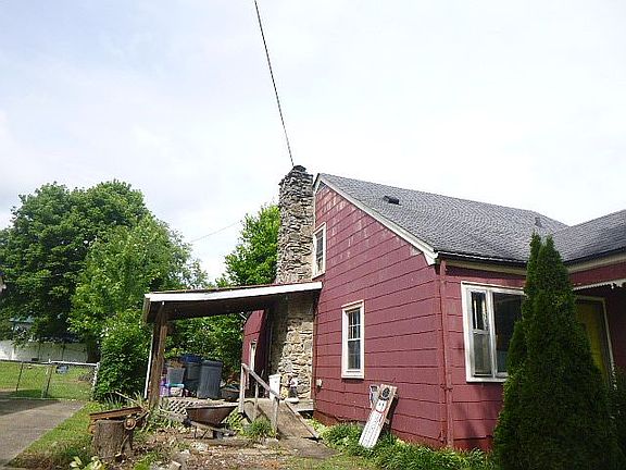 Left side with covered deck