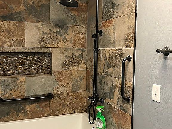 Upstairs bath 62 gal. tub