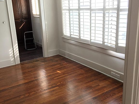 Large dining room adjacent to kitchen with lots of light