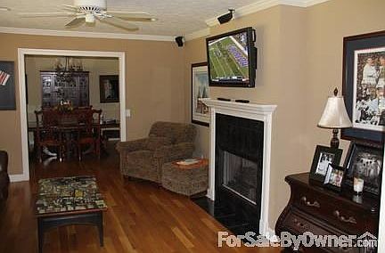 Living Room
						:
						Hardwoods, plantation shutters, wired for surround, gas dual sided fireplace