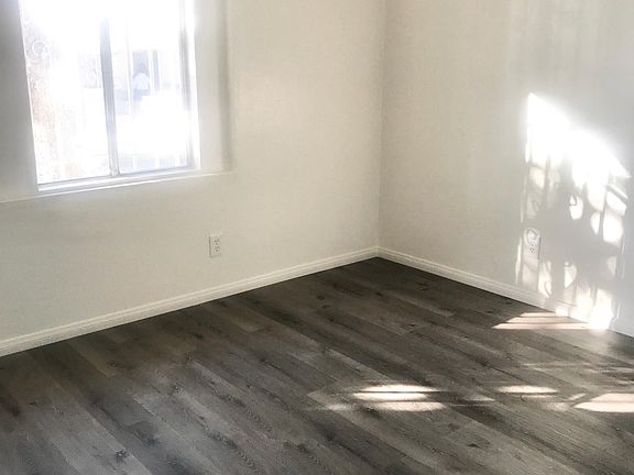 Living room with new laminate floor and paint