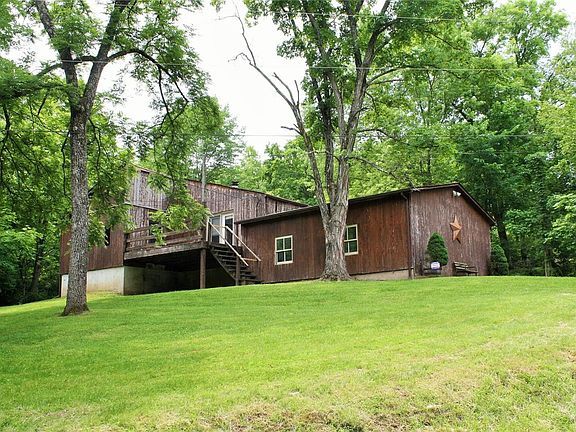 NO HOA, NO BUILDING REQUIREMENTS, LOW TAXES due to 8 acres zoned agricultural!