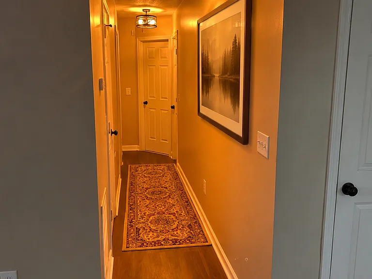 Hallway going to relaxing bedroom area
