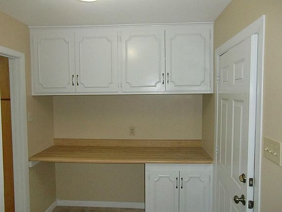 Laundry room with built-ins.
