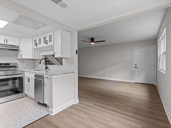 kitchen, dining space and living area
