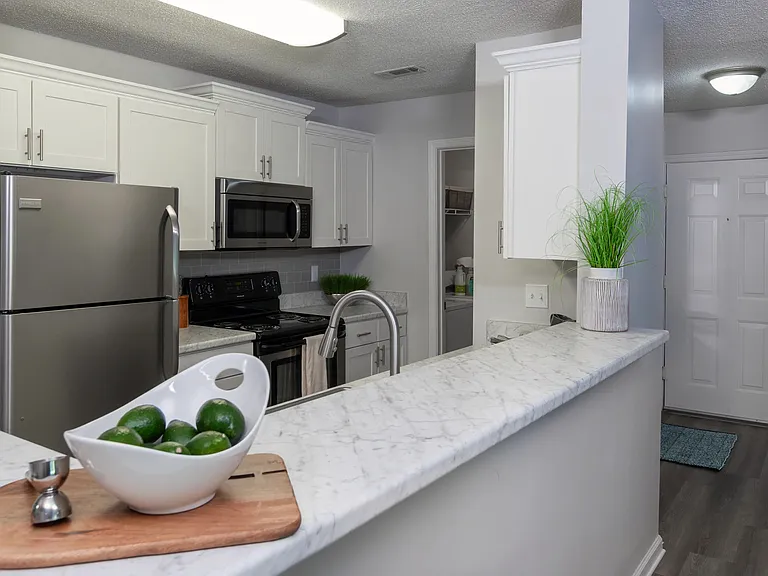 Our open-concept apartment homes include breakfast bars to make entertaining easy.