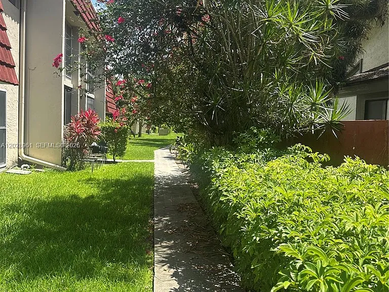 5 Jacaranda Country Club Dr #206 — Photo 2