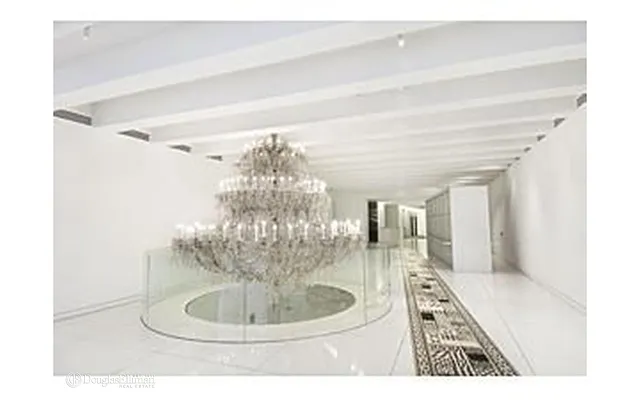 Sold by Douglas Elliman | media 13