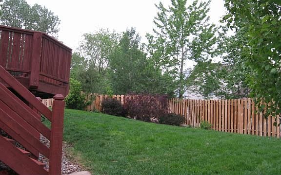 The backyard has full landscaping