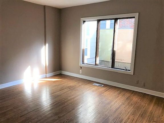 Windows looking out to courtyard.