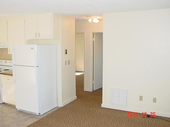 View of hallway to bedrooms with HVAC Room on the right