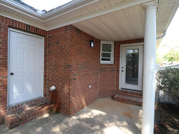 BACK DOOR AND STORAGE ROOM