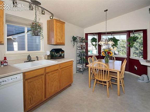 Large bay window let's in plenty of natural lighting.