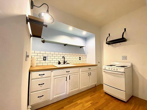 Kitchen. Small Fridge to be added. No dishwasher. Electric stove