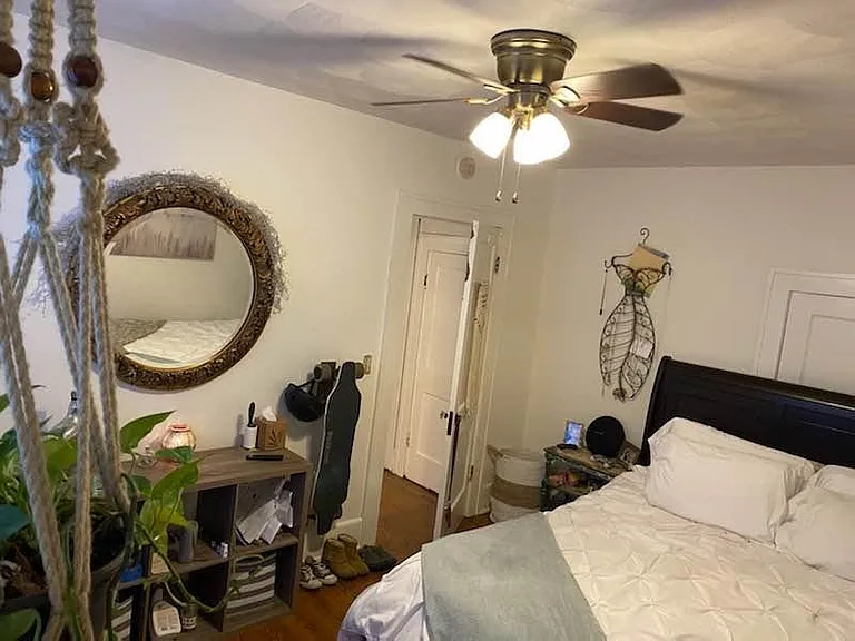 Bedroom One w/ Designer Ceiling Fan and Two Large Windows. Fits king size bed.