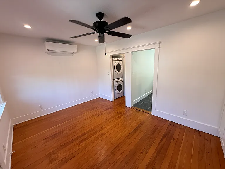 Side View of Living Area leading into Laundry and Kitchen