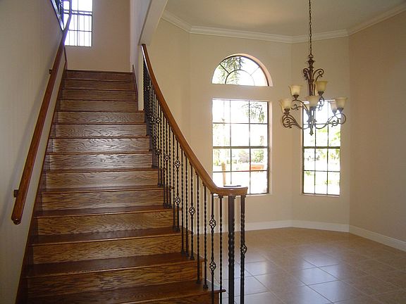 Oak Stairs adjcent to the Formal Dining Room