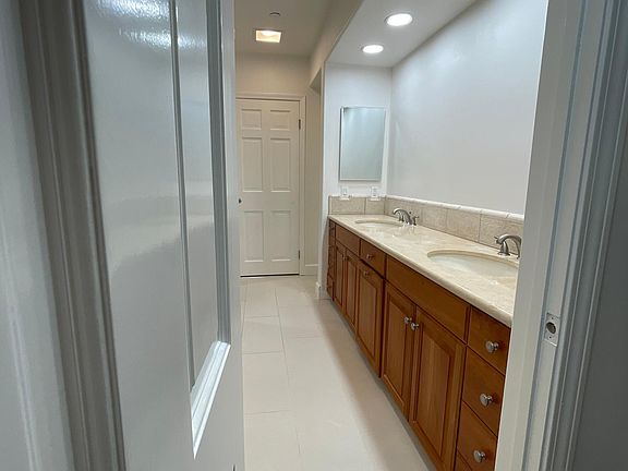 masterbathroom (new mirror being installed)