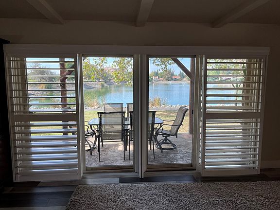 Main floor Living Room sliders with view of lake