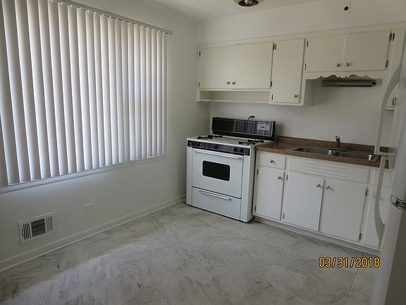 5th image of 7707 N Oconto Ave