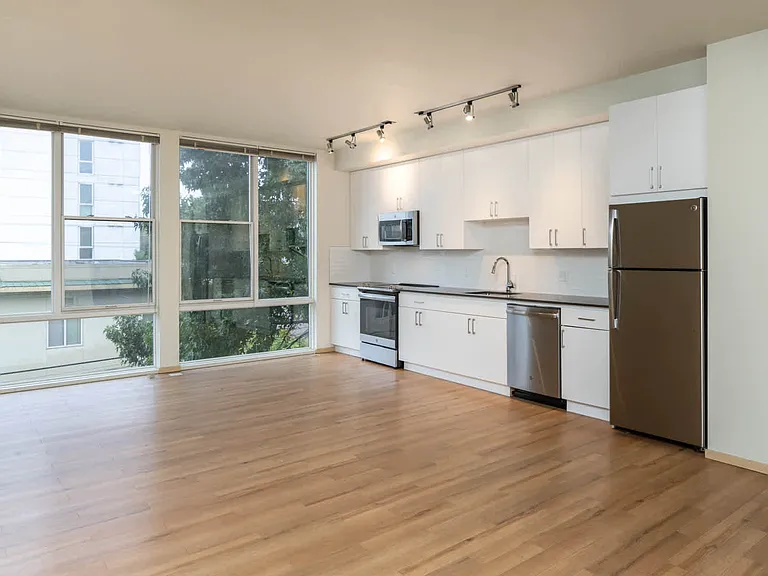 Studio Kitchen and Living Room with Floor-to-Ceiling Windows