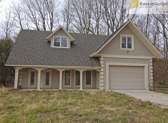 Second house to be used at a stable, boat storage or finished out to be  butler's quarters!  Has Heating and Cooling installed!